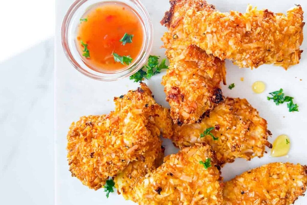 Healthy Coconut Crusted Chicken Tenders by Entirely Emmy