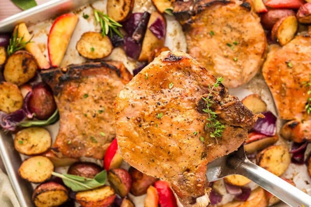 Sheet Pan Pork Chops with Potatoes by The Slow Roasted Italian